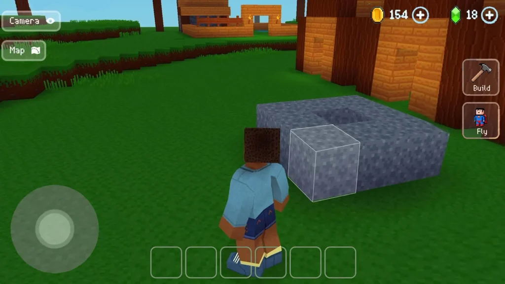 Player placing grey stone blocks near wooden houses while constructing a structure in Block Craft 3D